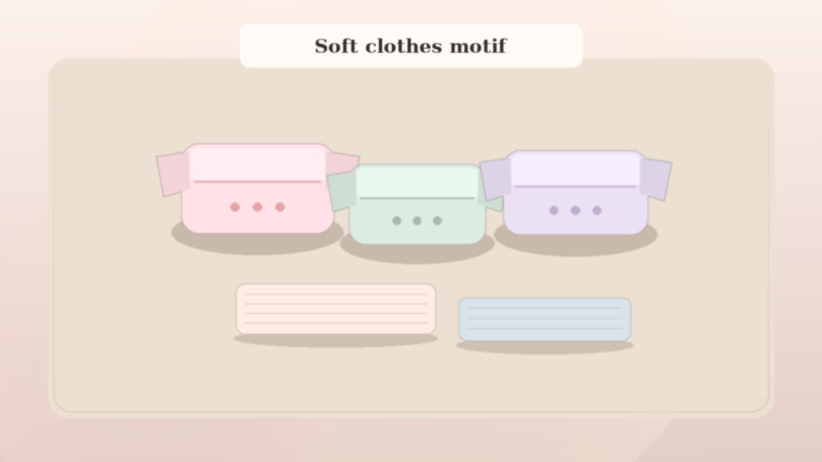 Soft pastel folded baby clothes and blankets motif for a motherhood essay announcement
