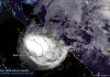 Hurricane Polo Hits Mexico Twice, Then Its Remnants Flood the US Southwest Night-time NOAA GOES-18 satellite image of Hurricane Polo's bright, dense cloud mass over the Baja California Sur peninsula, with the Gulf of California and Sonora to the northeast under lighter cloud, thin coastline outlines and city lights on the mainland