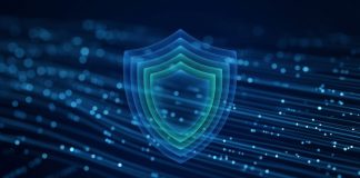 Google Gemini 4 Argon Launches First to Cyber Defenders Ahead of Wider Release A glowing layered blue and teal shield floating over streams of light particles on a dark blue background