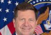 Trump Names Jay Clayton to Lead New Super Intelligence Force on AI Official portrait of Director of National Intelligence Jay Clayton in front of the U.S. flag and ODNI seal