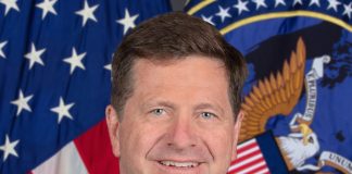 Trump Names Jay Clayton to Lead New Super Intelligence Force on AI Official portrait of Director of National Intelligence Jay Clayton in front of the U.S. flag and ODNI seal
