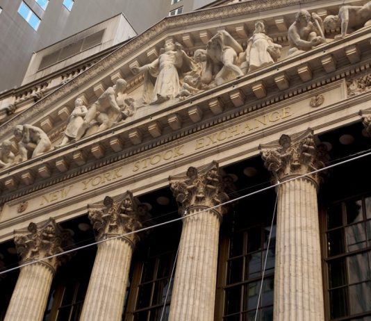 Stocks Face Oil and Bond Yield Test This Week as Fed Minutes Loom Broad Street facade of the New York Stock Exchange with its columns and carved pediment in Lower Manhattan