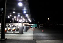 Trump Opens Red-Dyed Diesel to Highways, Defers Federal Tax Through Dec. 31 Diesel pumps under a lit canopy at a Flying J truck stop at night, with a semi-truck parked nearby