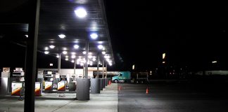 Trump Opens Red-Dyed Diesel to Highways, Defers Federal Tax Through Dec. 31 Diesel pumps under a lit canopy at a Flying J truck stop at night, with a semi-truck parked nearby