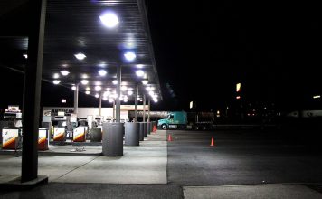 Trump Opens Red-Dyed Diesel to Highways, Defers Federal Tax Through Dec. 31 Diesel pumps under a lit canopy at a Flying J truck stop at night, with a semi-truck parked nearby
