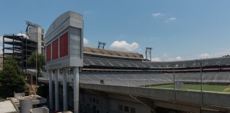 Auburn Upsets No. 1 Georgia 27-24 as Five AP Top-8 Teams Lose Empty Sanford Stadium in Athens, Georgia, seen from the west side under a blue summer sky