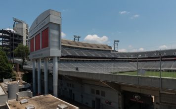 Auburn Upsets No. 1 Georgia 27-24 as Five AP Top-8 Teams Lose Empty Sanford Stadium in Athens, Georgia, seen from the west side under a blue summer sky
