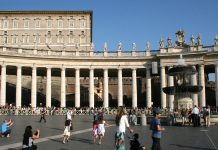Pope Leo XIV Leads Sunday Angelus Days After Lung Cancer Surgery The Apostolic Palace rises above Bernini's colonnade and a fountain as visitors walk through St. Peter's Square