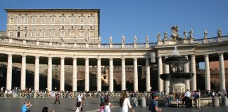 Pope Leo XIV Leads Sunday Angelus Days After Lung Cancer Surgery The Apostolic Palace rises above Bernini's colonnade and a fountain as visitors walk through St. Peter's Square