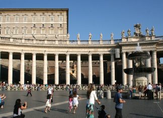 Pope Leo XIV Leads Sunday Angelus Days After Lung Cancer Surgery The Apostolic Palace rises above Bernini's colonnade and a fountain as visitors walk through St. Peter's Square