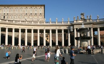 Pope Leo XIV Leads Sunday Angelus Days After Lung Cancer Surgery The Apostolic Palace rises above Bernini's colonnade and a fountain as visitors walk through St. Peter's Square