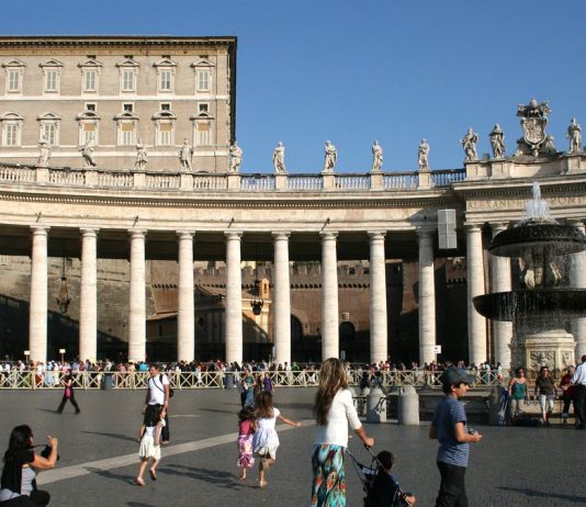 Pope Leo XIV Leads Sunday Angelus Days After Lung Cancer Surgery The Apostolic Palace rises above Bernini's colonnade and a fountain as visitors walk through St. Peter's Square
