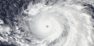 Super Typhoon Champi Nears Category 5 After Narrow Miss of Guam Satellite view of Super Typhoon Champi's clear eye and spiral cloud bands over the Philippine Sea