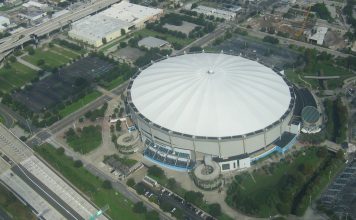 Rays Beat Guardians 7-3 to Win AL Pennant, Face Brewers in World Series Aerial view of Tropicana Field's white domed roof in St. Petersburg, Florida, surrounded by highways and parking lots