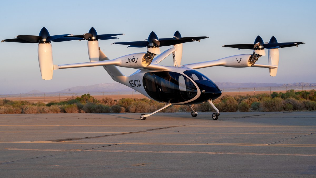 Joby Aviation experimental electric vertical takeoff aircraft with tilting propellers parked on a taxiway at Edwards Air Force Base